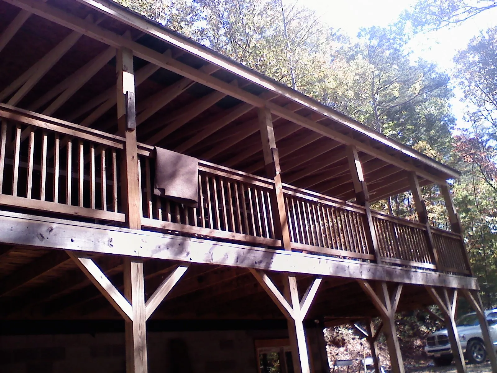 Timber framing under a new elevated porch and deck — Roof Leak Repair in New Liberty by Roofing Brothers